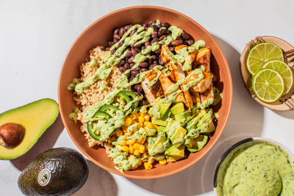 The current image has no alternative text. The file name is: Chicken-Avocado-Burrito-Bowls-with-California-Avocado-Cilantro-Sauce-Photos-14-1-scaled-e1680677230235.jpg